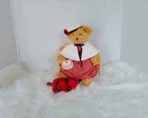 Custom-clothed soft toy teddy bear (original base : Mumbles Bear) with unique, handcrafted autumn dress, cape, French beret, and handbag by Enchanting World.