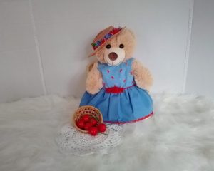 New, high-quality generic, non-branded soft toy teddy bear with unique, custom-made summer dress and boater hat by Enchanting World.