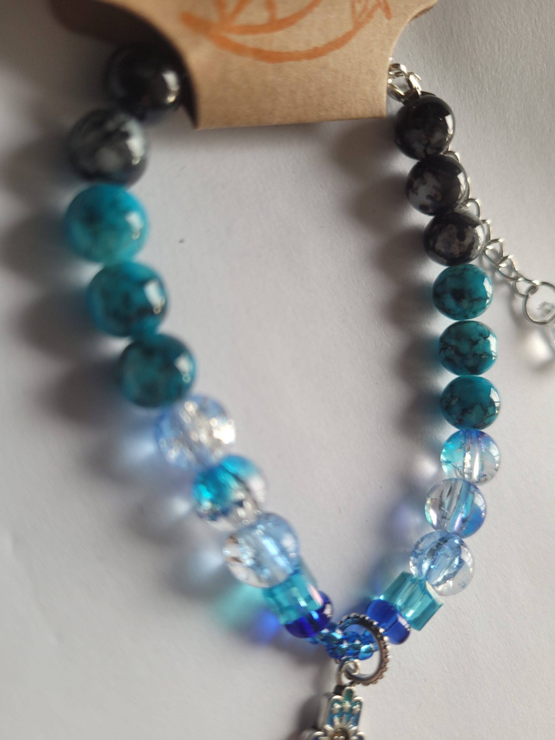 Handmade Blue Crackled Glass Beaded Bracelet with Silver All-Seeing Eye Charm - Image 3