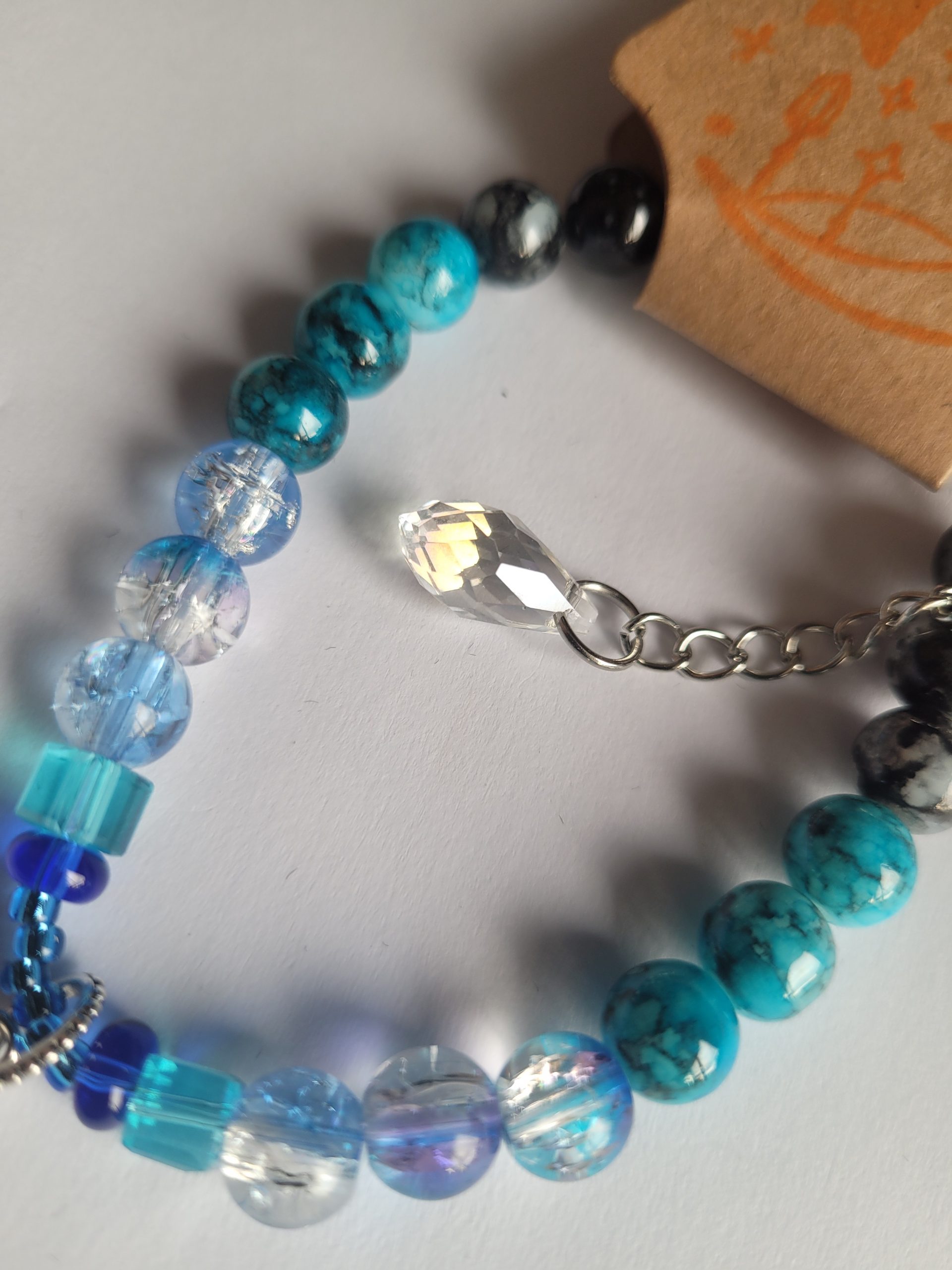 Handmade Blue Crackled Glass Beaded Bracelet with Silver All-Seeing Eye Charm - Image 2