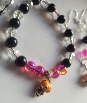 Handemade bracelet and earring set with 925 Sterling Silver pumpkin charm