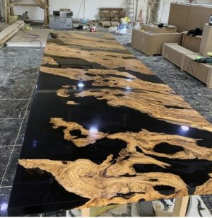 Solid wood table with resin