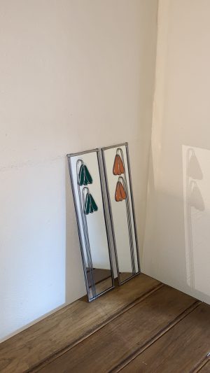 Mirrors with Green & Orange flowers.