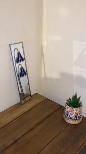 Mirror with bluebell design.