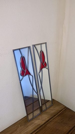 Mirrors with red Lillies.