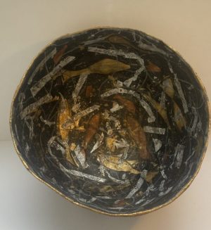 Multi gilded bowl of fish and flora in the black sea