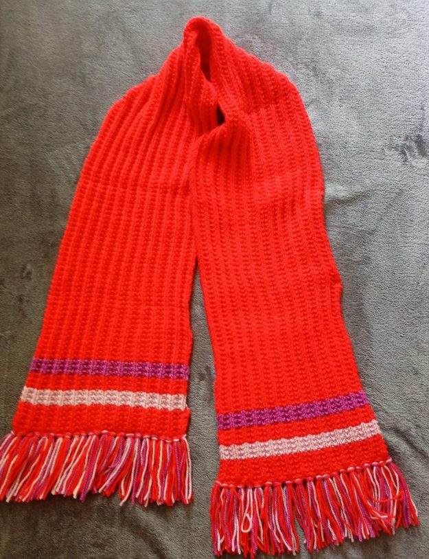 Red hand-knitted scarf