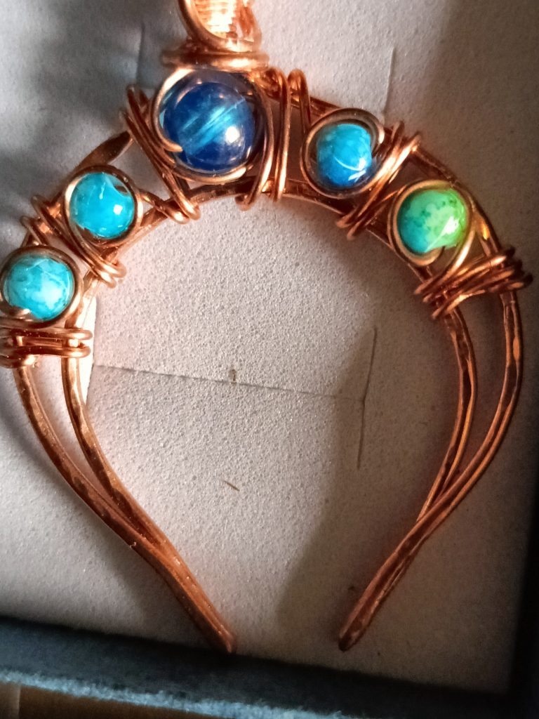 Crescent shape copper pendant