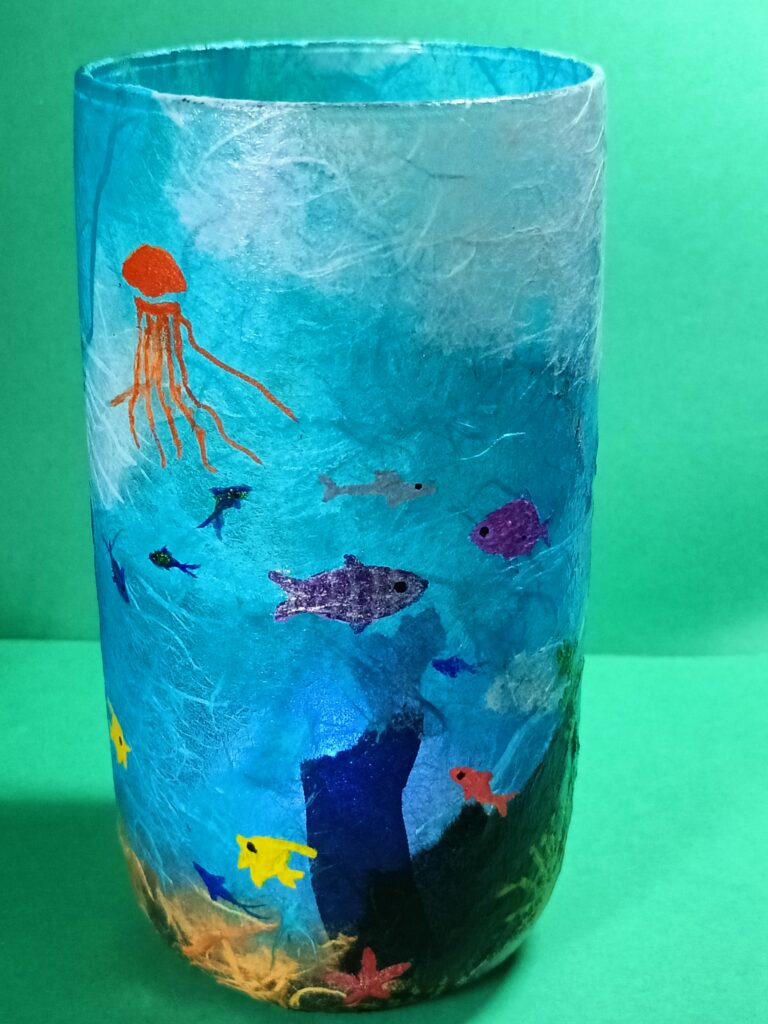 Hand decorated glass with tea light