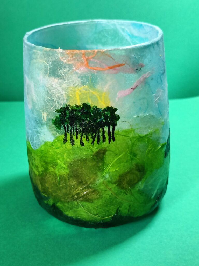 Hand decorated glass with tea light