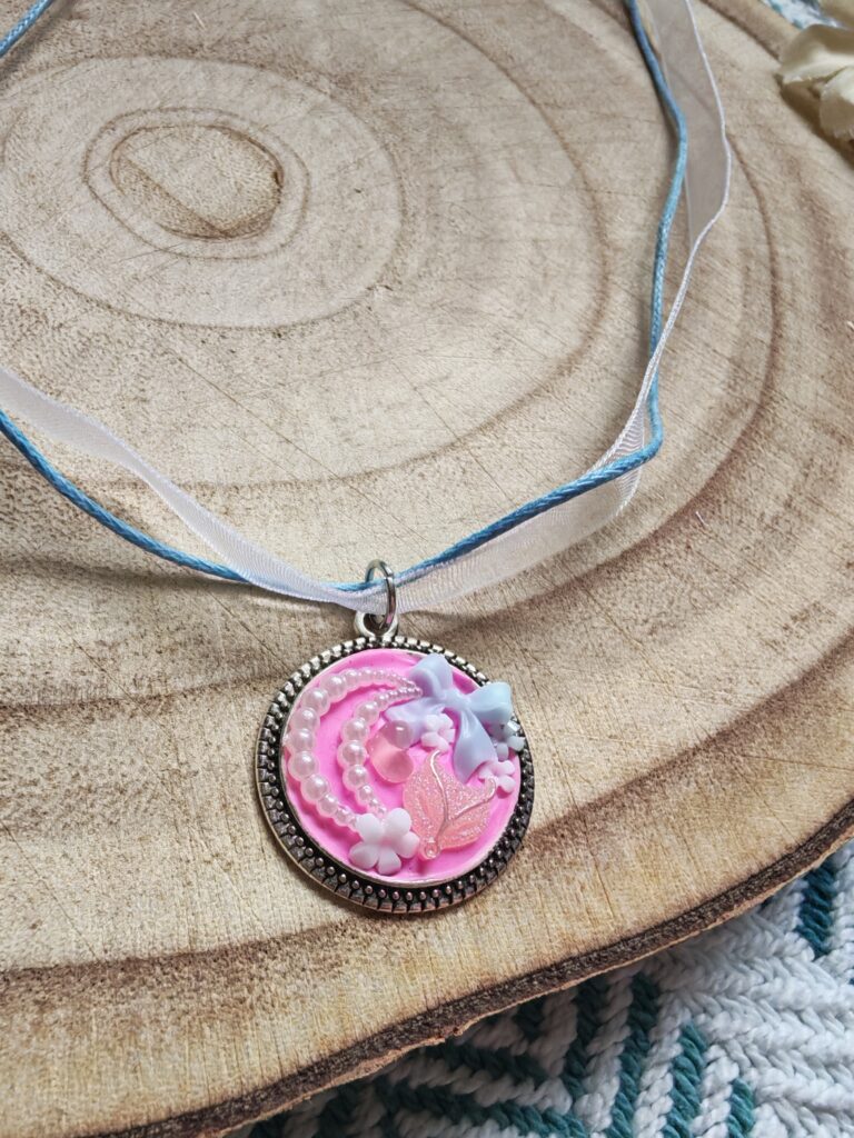 Girls pink moon pendant with mixed fabric necklace